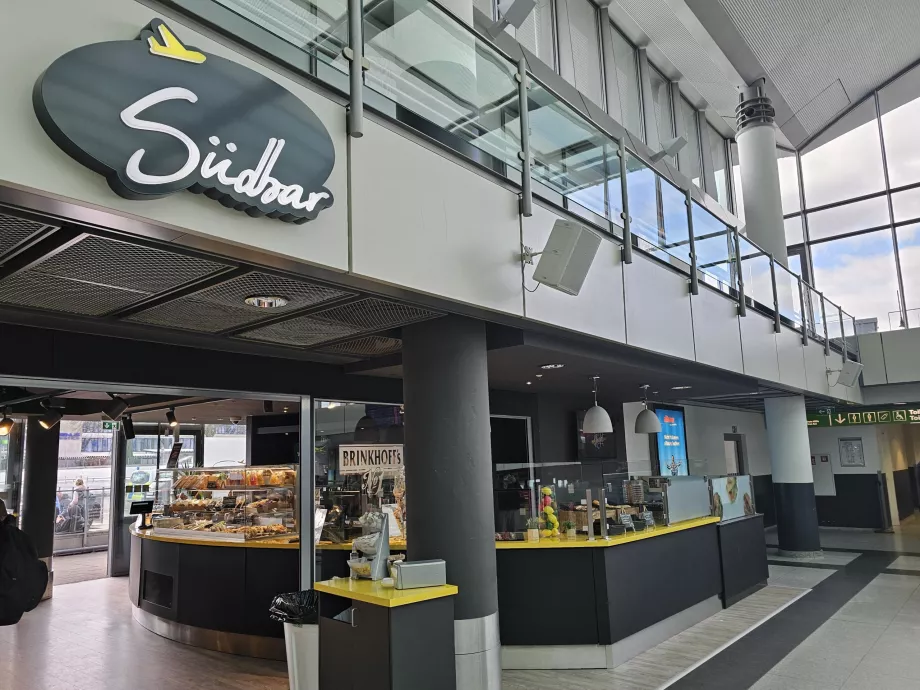 Restoranas išvykimo salėje