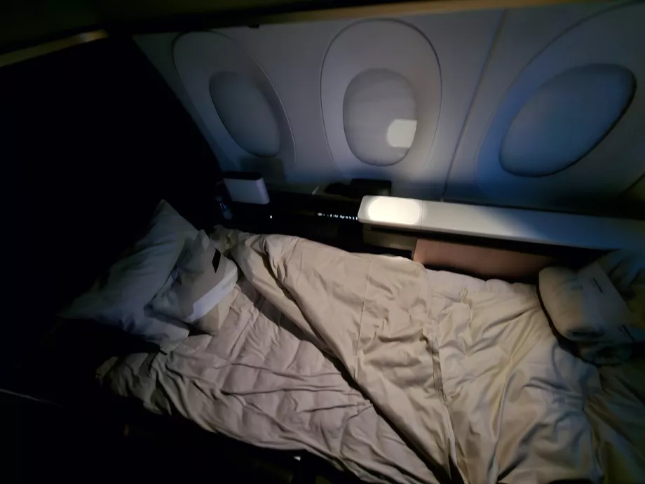 Sofa, išskleista į lovą